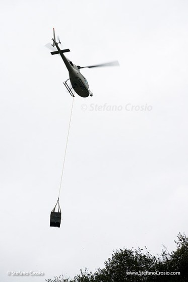 Helicopter carrying Nino Negri's harvested mountain Nebbiolo grapes